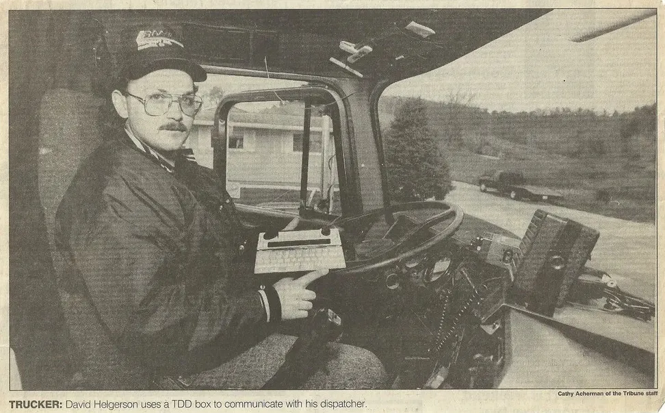 Newspaper clipping about deaf trucker David Helgerson and his TDD communication device