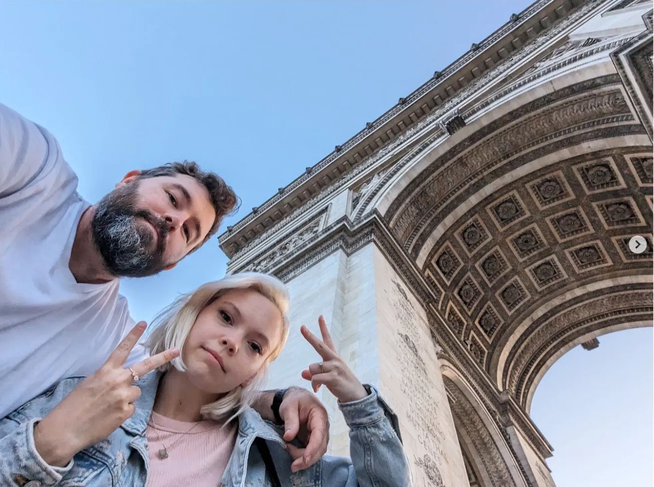 Matt Haynes and his wife visit the Arc de Triomphe in Paris while working remotely
